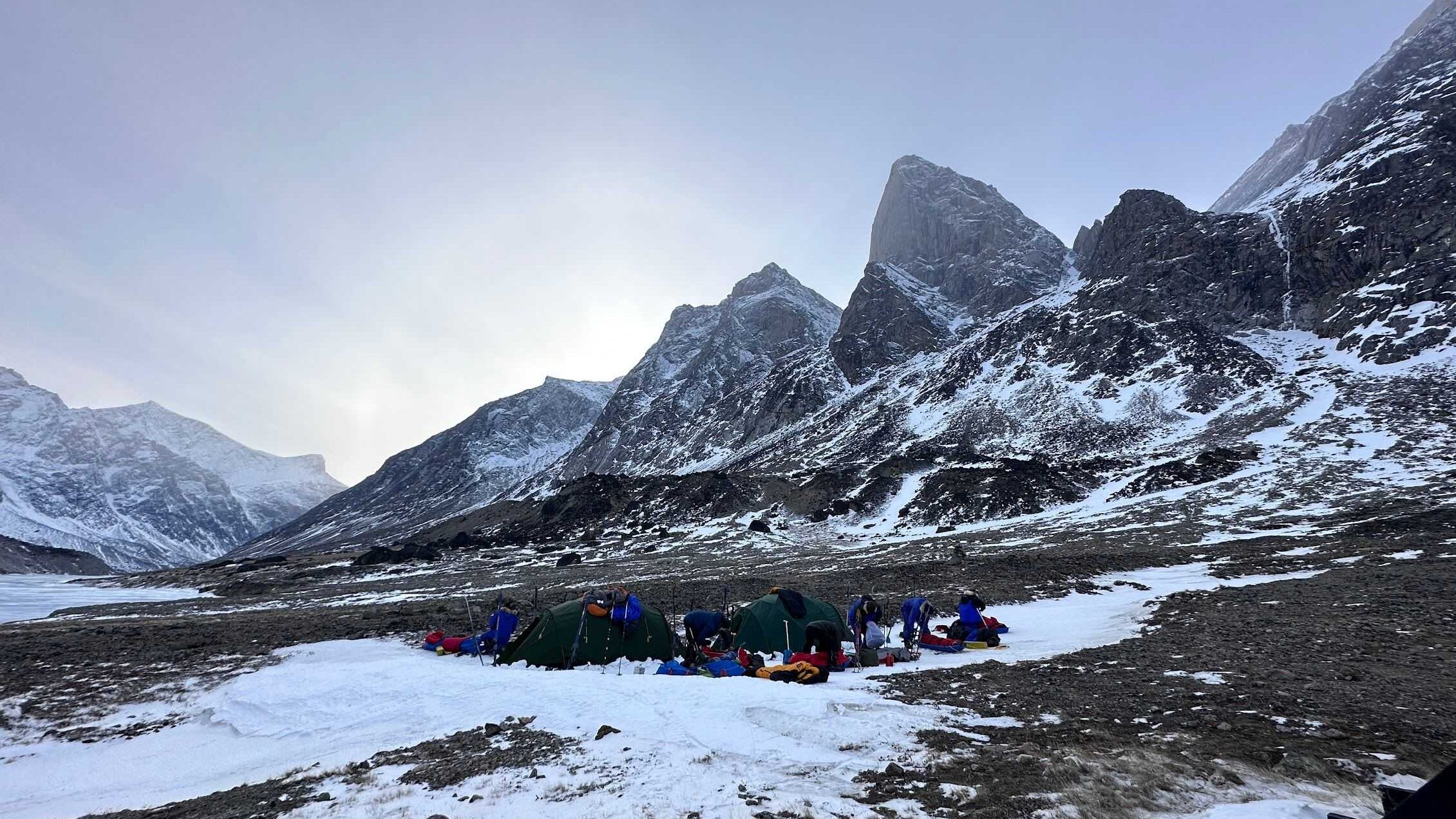 A group of people camping in the snow on the Baffin Island in Terra Nova Terra Firma Expedition Tents