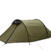 Olive-green tunnel-style camping tent with black trim and a small front awning, pitched and tensioned by yellow guy lines and stakes.