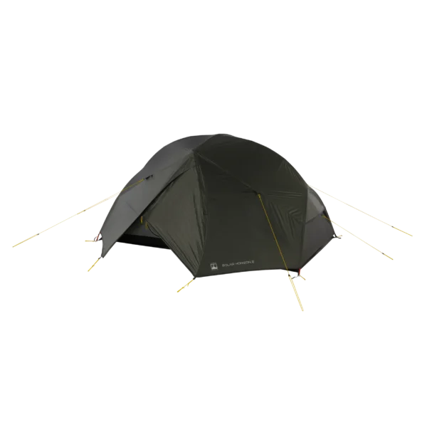Dark green dome-style two-person camping tent with an extended vestibule, taut yellow guylines and pegged corners, shown isolated on a black background.