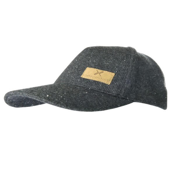 23FC-Furnace-Cap-300dpi-3.jpg Dark grey speckled wool baseball cap with a curved brim and a small tan rectangular leather logo patch on the front.