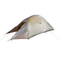 Low-profile lightweight silvery single-person dome tent with a small brown vestibule awning, yellow guy lines and a green groundsheet edge, shown pitched.