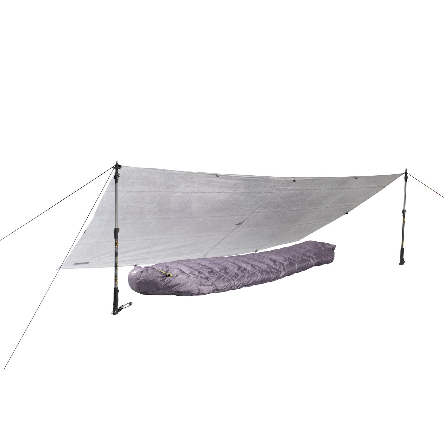 43TU1-Ultra-tarp-1-with-sleeping-bag-sqaure-3.jpg Silver emergency tarp pitched as a low shelter using two adjustable trekking poles and guylines, covering a purple mummy-style sleeping bag beneath.