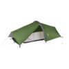 Low-profile green single-person tunnel tent with a grey arched pole and yellow guy lines, partially open to reveal pale mesh inner and dark groundsheet.