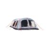 Spacious grey and dark-blue tunnel-style family tent with a large arched door, multiple clear and mesh windows and red guy lines staked out, shown on a plain white background.