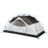 Two-person dome camping tent with white lower panels and black upper mesh, supported by crossed blue poles and featuring a large D-shaped zip door and mesh roof panels, shown on a white background.