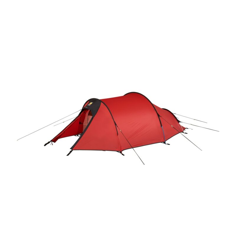 Red tunnel-style camping tent with black trim, front vestibule, curved poles and multiple guylines staked out against a plain white background.