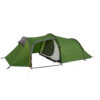 Blizzard-3-SS22-Fly-door-open_1500px_72dpi-3.jpg Green tunnel-style camping tent with an extended vestibule and open front showing a white mesh inner sleeping compartment, grey trim, yellow guy lines and black support poles on a plain white background