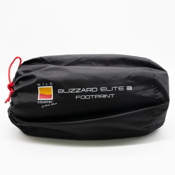 Black cylindrical stuff sack with a red drawcord and a printed white logo reading "Wild Country Blizzard Elite 3 Footprint".