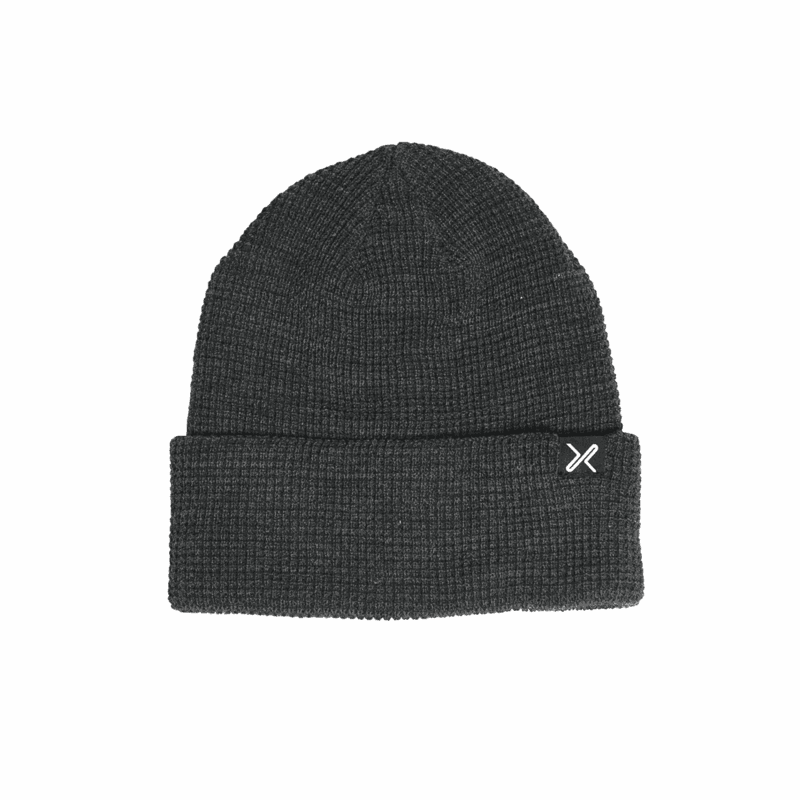 Contour-Eco-Polyana-Waffle-Beanie-Heather-Grey_3000px_300dpi-e1662542296795-1.png Dark charcoal ribbed knit beanie with a folded cuff and a small white 'X' logo stitched on the right, displayed on a plain white background.