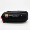 Hoolie-Compact-2-1-3.jpg Black cylindrical storage bag with a red drawcord, printed white text reading "Hoolie Compact 2 Footprint" and a small Wild Country logo, photographed on a plain white background.