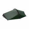 Low-profile dark green one-person tunnel tent with a curved black front pole, taut rainfly and pale guy lines pegged at the corners on a white background.