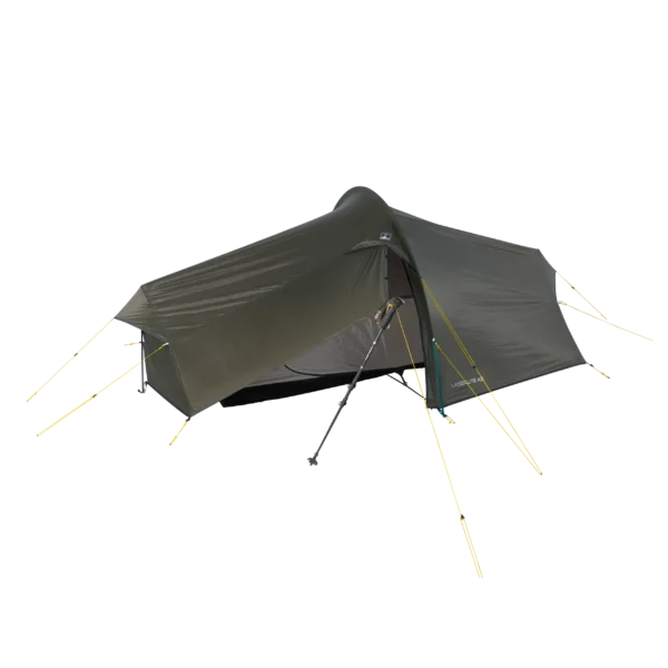 Dark olive-green tunnel-style backpacking tent with an open vestibule revealing an inner mesh sleeping area, staked out with yellow guy lines and propped at the entrance by a trekking pole, shown against a black background.