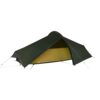 Laser_Compact_1_Tent-3000x3000px-300dpi-scaled-2.jpg Low-profile dark green single-person tunnel tent with a partially open rainfly showing a yellow inner sleeping area, staked out with guy lines.