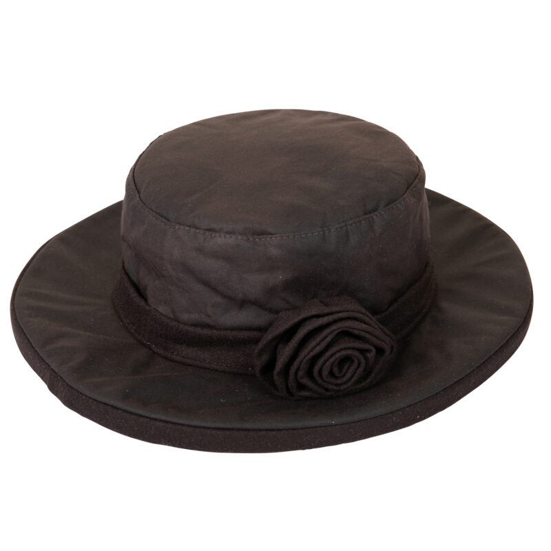 Black wide-brimmed women's hat with a flat, round crown and a matching fabric rose on the band.
