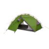 Panacea-2-Photoshoped-Logo-1.jpg Green two-person dome tent with red external poles and grey trim, front flap open to reveal a mesh inner door and black groundsheet, staked down with yellow guy lines