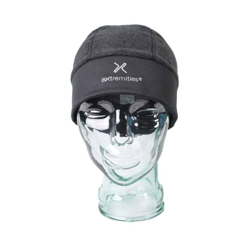 Powerfleece-Polartec-Banded-Beanie-Front-Grey-1500x1500-72dpi-1.jpg Charcoal fleece beanie with a black folded cuff and white "extremities®" logo, displayed on a clear glass mannequin head against a white background.