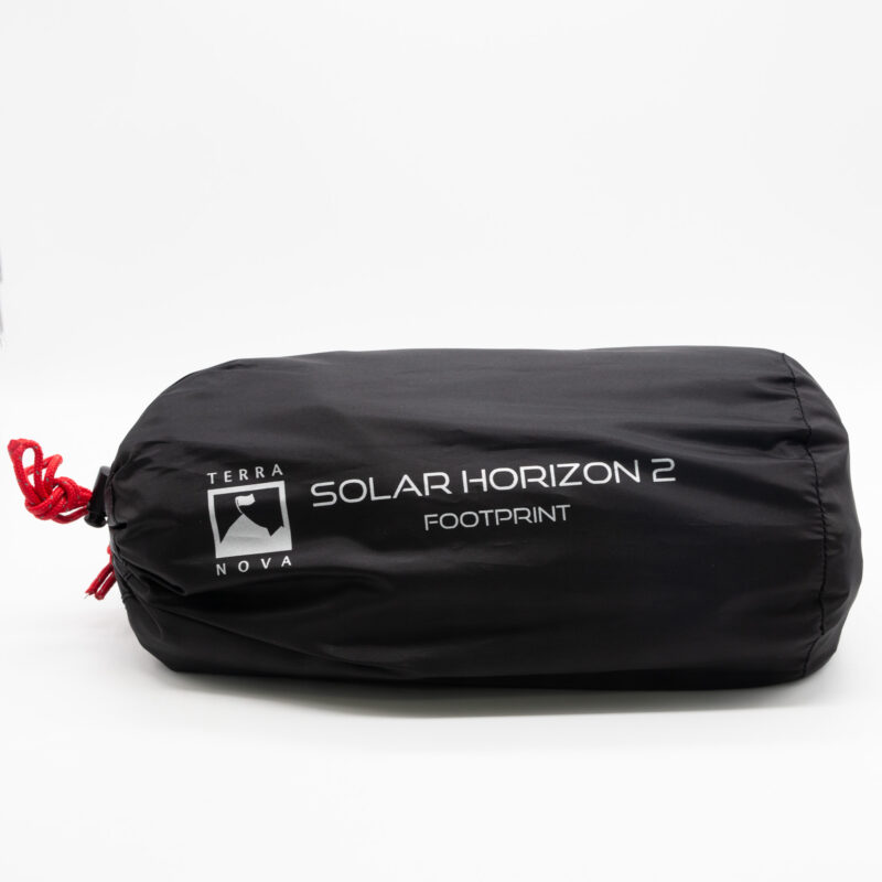 Solar-Horizon-2-1-3.jpg Black cylindrical stuff sack with a red drawstring, labelled 'Terra Nova Solar Horizon 2 Footprint' on the side.