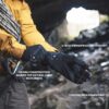 Station-Glove-1-3.jpg Person wearing a yellow jacket and climbing harness pulls on black windproof gloves near a rocky cave entrance, a coiled climbing rope and carabiner visible, with on-image labels pointing to the gloves reading X-Block Windproof Technology, Flexible construction allows for natural hand movements and Touchscreen compatible.