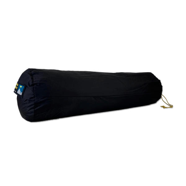 Tent-Bags-1-3.png Long black cylindrical sleeping-bag stuff sack with a yellow drawcord and a small blue-and-yellow logo patch on the left, shown on a white background.