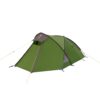Green dome-tunnel camping tent with a grey rainfly, black support poles and yellow guy lines staked out, shown on a white background