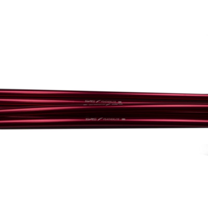 Stack of glossy deep-red aluminium tent poles arranged horizontally across the centre of a white background, with faint printed DAC Featherlite branding visible