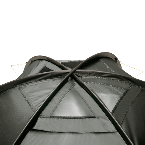 Vault-Duo-Top-Vent_3000px_72dpi-3.png Close-up of the top of a dark green camping tent showing two black flexible poles crossing in an X over triangular mesh ventilation panels and stitched seams, with thin guy lines extending from the upper corners.