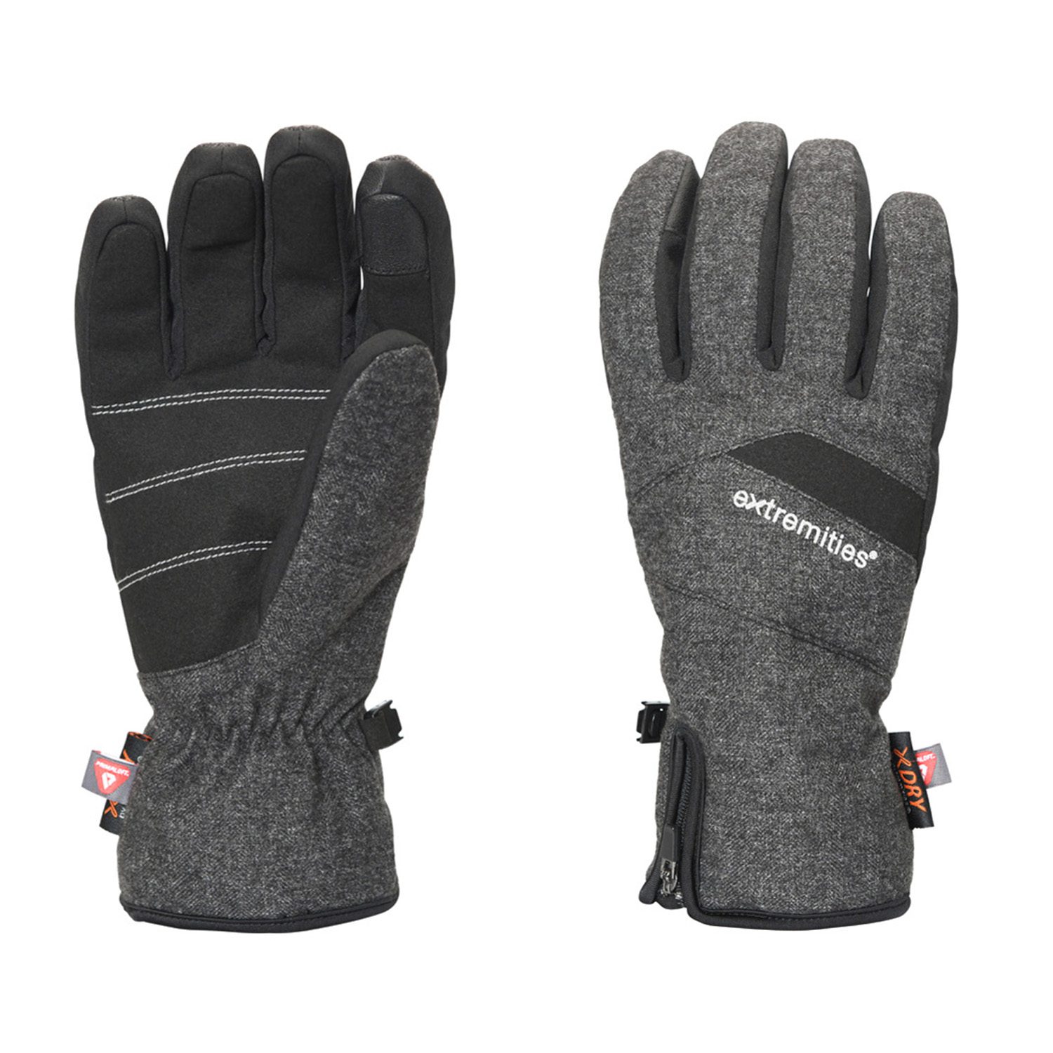 Vermont-Glove-Back-and-Palm_1500px_300dpi-1.jpg Pair of grey and black insulated winter gloves on a white background — the left glove shows a black palm with white stitching and an elasticated cuff, the right glove shows a grey fabric back with the 'extremities' logo, a small zip and a hanging tag.