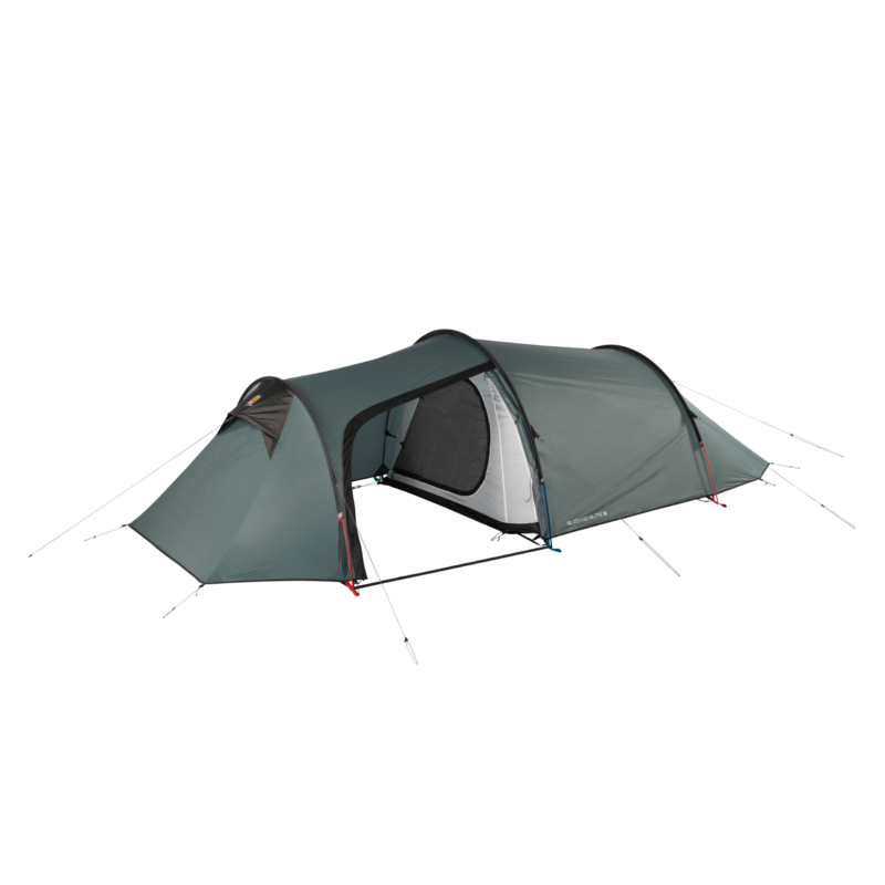 Green-grey tunnel-style camping tent with two connected sleeping compartments and a central covered entrance showing an inner mesh door, arched poles, guy lines and pegs