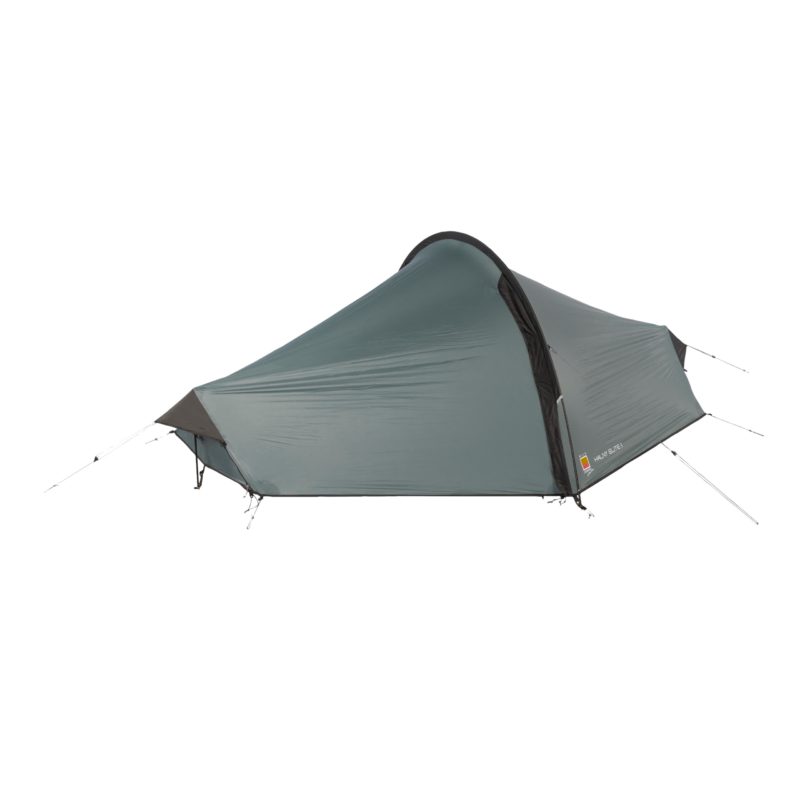WC-Halny-Elite-1-CO1-3.webp Low-profile grey-green single-person tunnel tent pitched with external guy lines and alloy poles, showing a black-trimmed zipped entrance and tapered foot end.