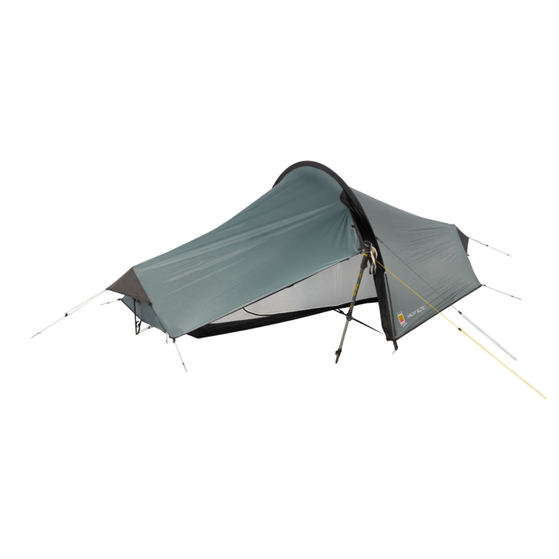 WC-Halny-Elite-1-CO3-3.webp Low-profile single-person grey-green tunnel tent with a front vestibule propped open by a trekking pole, showing inner mesh and guy lines.