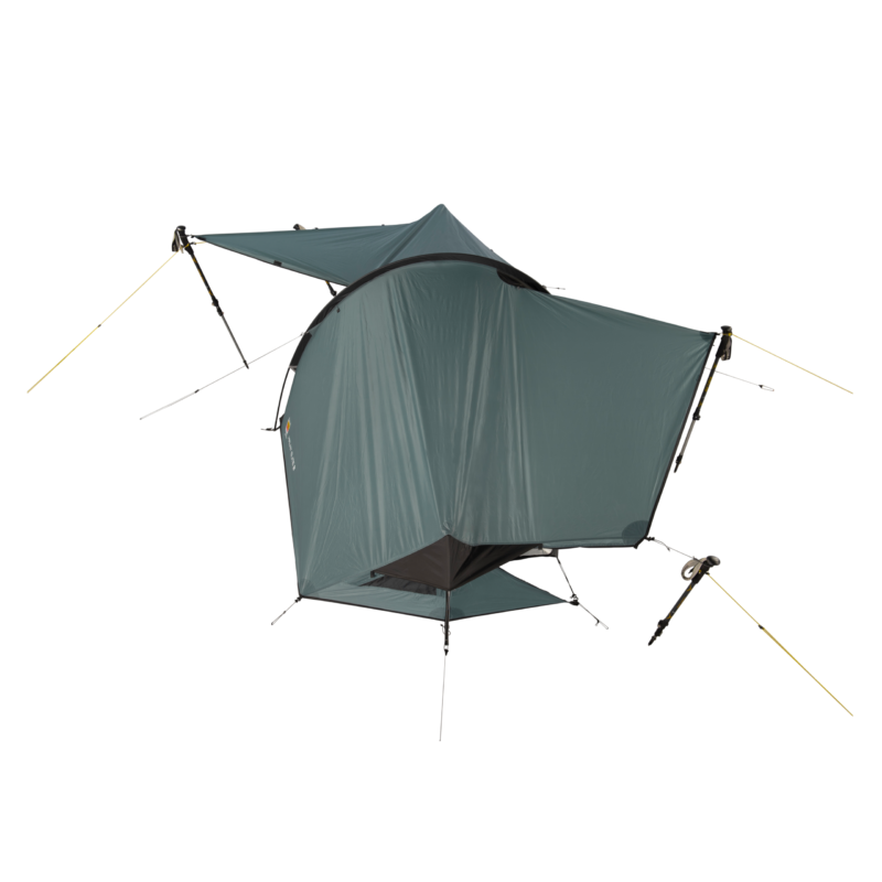 Lightweight teal-green backpacking tent pitched with trekking poles and yellow guy lines, showing a curved rainfly, triangular vestibule and raised bathtub floor against a plain white background.