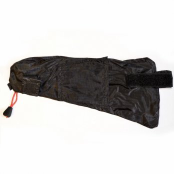 Zip_Pockets_1-1.jpg Black tapered fabric sleeve laid flat on a white background, with a red drawstring toggle at the narrow end and a wide Velcro strap near the wider end.