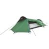 coshee-1-tent_5BDB1939_large-1.jpg Green single-person tunnel-style backpacking tent with black trim and coloured support poles, flysheet partially rolled back to reveal white mesh inner tent and groundsheet, secured with guylines on a white background