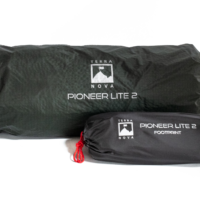 Dark green rolled tent bag labeled Terra Nova Pioneer Lite 2 alongside a smaller black stuff sack marked Pioneer Lite 2 Footprint with a red cord pull.