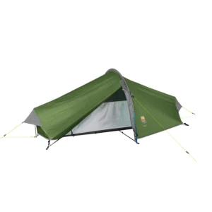 Low-profile green one-person tunnel tent with grey accents and yellow guy lines, partially open at the front to reveal a light-grey inner sleeping area and black pole supports.