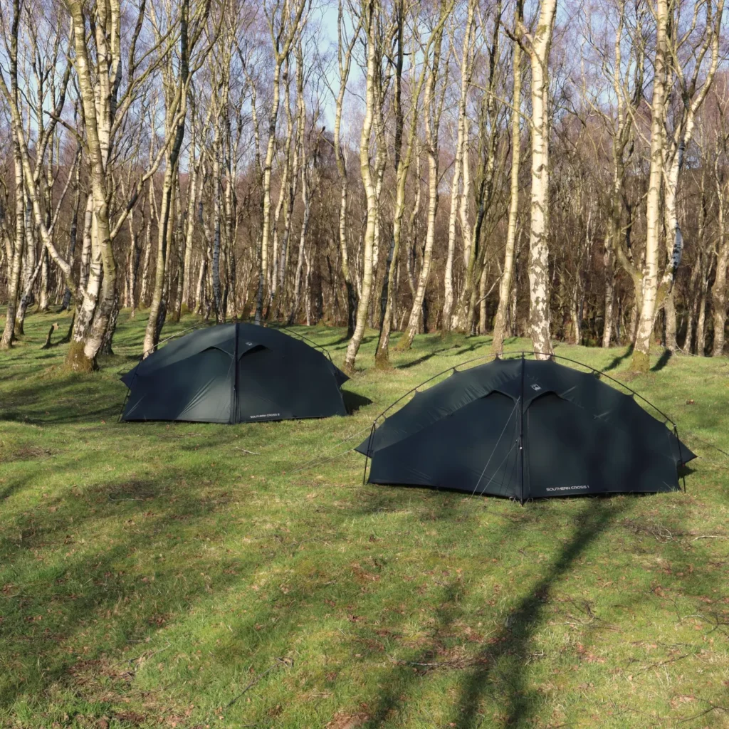 Line-drawn placeholder icon showing a square frame with two mountain-like peaks and a circular sun, centered on a white background.