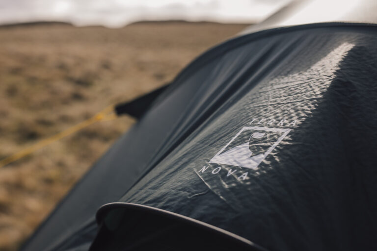 A close up of a Terra Nova tent showing our main Terra Nova Logo as well as detail of our TriPlex Fabric.
